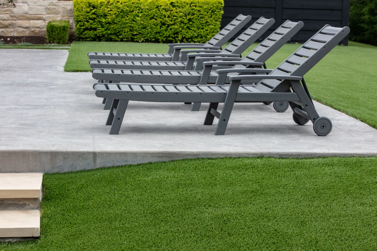 An installation of artificial turf and artificial grass in an backyard in Bastrop