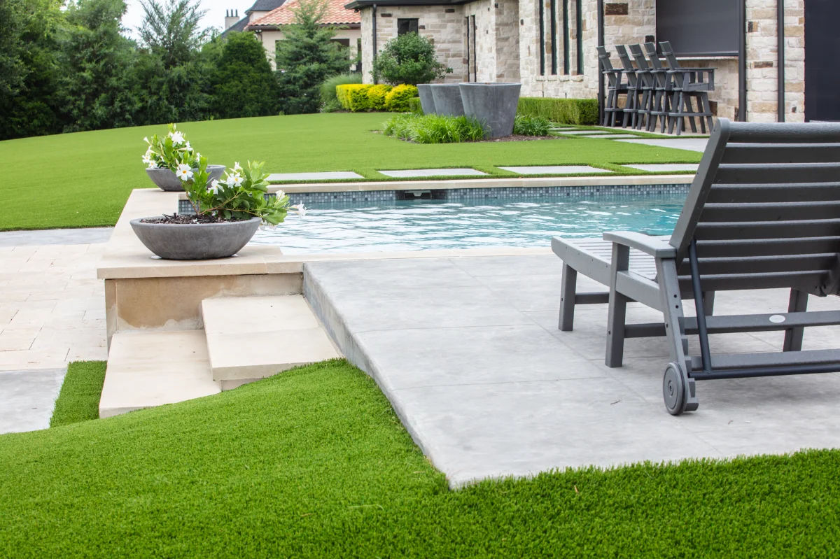 An installation of artificial turf and artificial grass in an backyard in Driftwood