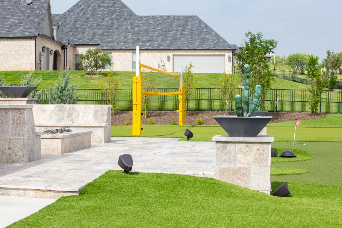 An installation of artificial turf and artificial grass in an backyard in Quail Hollow