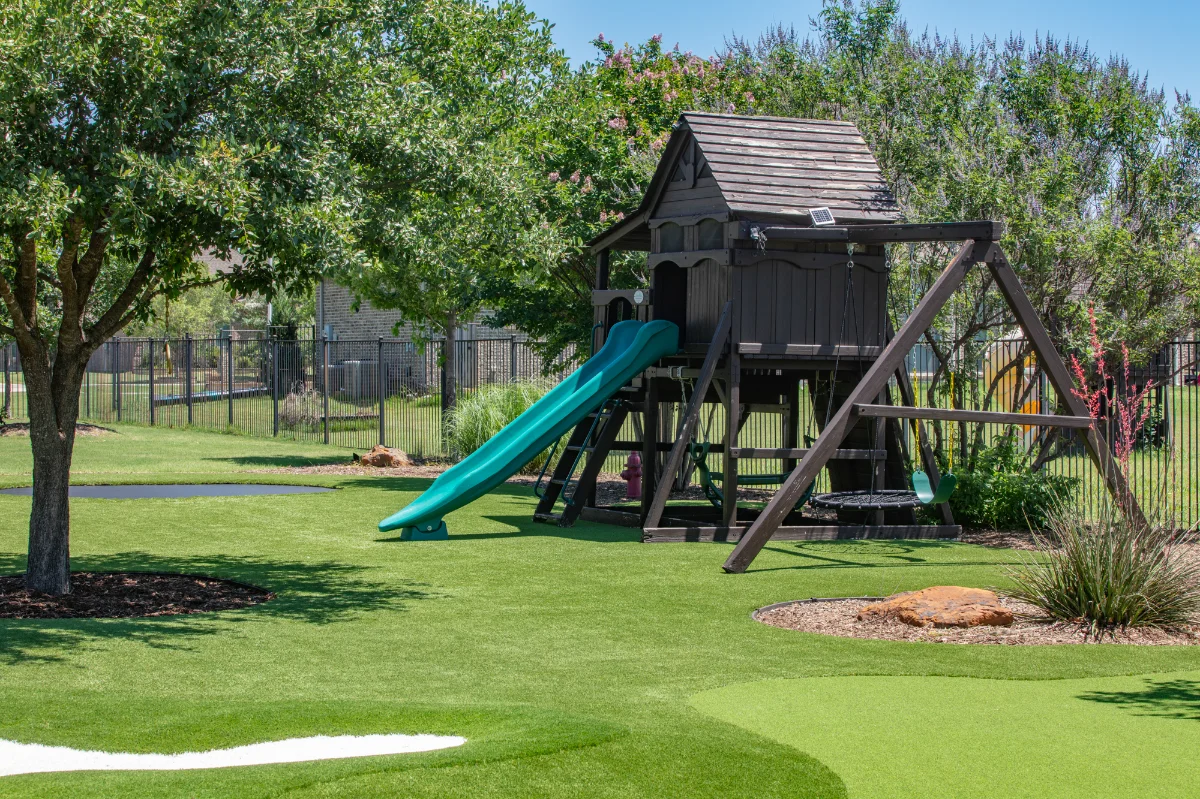 An installation of artificial turf and artificial grass in an backyard in Fresno