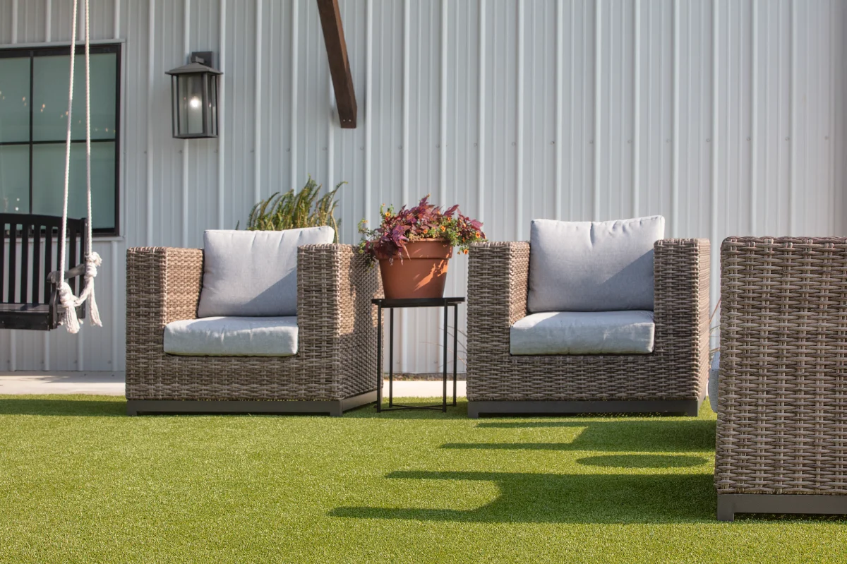 An installation of artificial turf and artificial grass in an backyard in The Woodlands