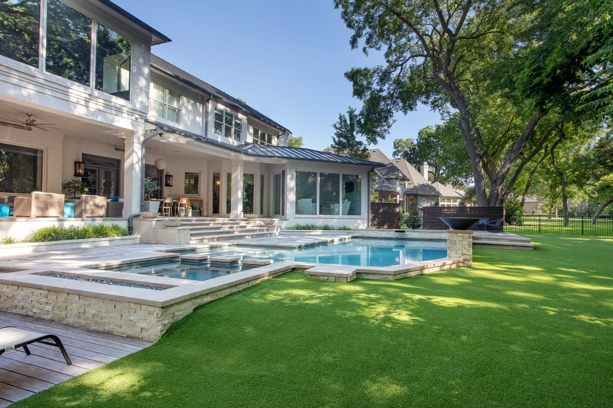 Artificial Grass Lawn in Tampa with a hot tub and pool